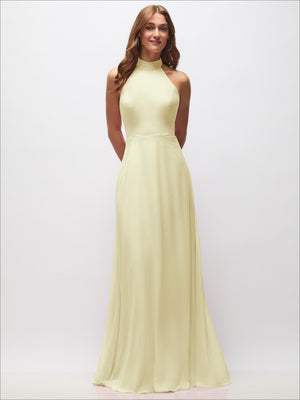 Soft pale yellow high-neck halter backless maxi dress with fitted bodice and flowing skirt