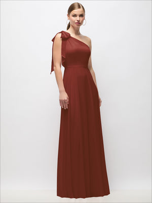 Rust draped one-shoulder maxi dress with scarf bow, front view