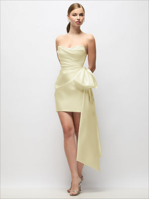 Butter yellow strapless satin mini dress with pleated twist and long draped bow tail