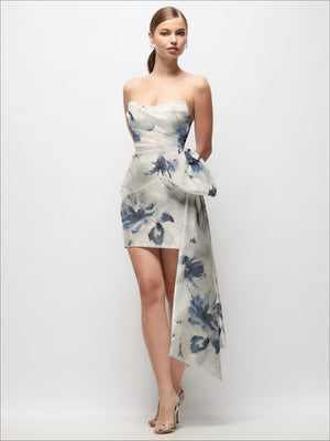 Light blue floral satin strapless mini dress with pleated waist and long draped bow tail