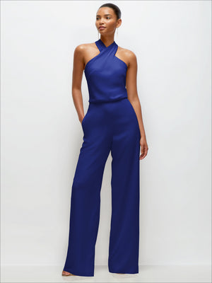 Blue halter crepe wedding jumpsuit with wide legs and sleeveless high neckline