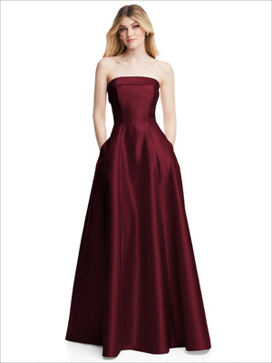Deep burgundy strapless satin gown with fitted bodice and full gathered skirt