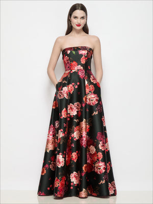 Floral satin strapless dress with black base and pink-red rose print, full skirt