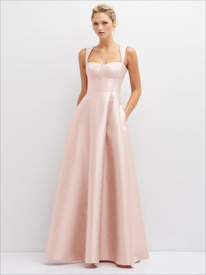 Blush satin bustier dress with spaghetti straps and full twirl skirt