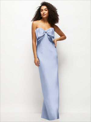 Strapless satin column maxi dress in light blue with large bow at bust, sleek straight fit