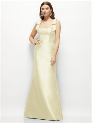 Light yellow satin fit-and-flare maxi dress with shoulder bows and square neckline
