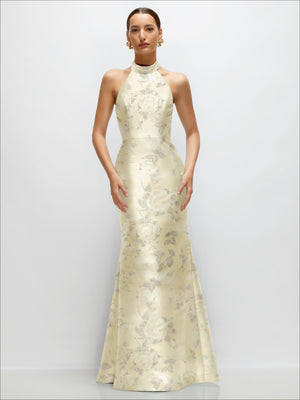 High-neck halter satin trumpet dress with floral print, open back, light off-white color.