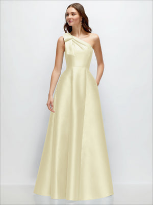 One-shoulder satin maxi dress in pale cream with bow detail and full A-line skirt