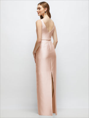 Blush satin column dress with V-back and skinny belt with bow-trim detail