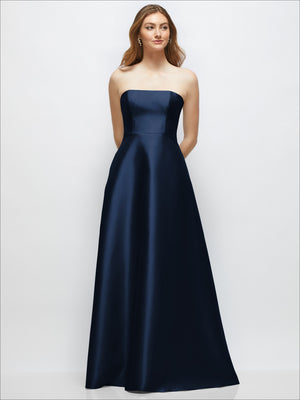Strapless satin gown with full skirt in dark navy, fitted bodice, strapless neckline.