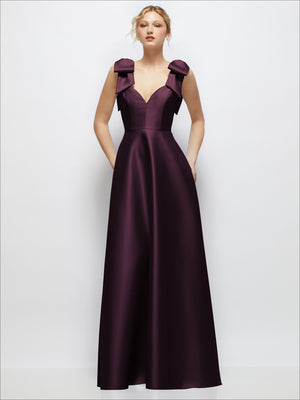 Deep plum satin ball gown with deep V-neck and bow-strap shoulders, long skirt