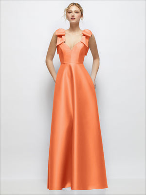Peach satin ball gown with deep V-neck and bow-shoulder details