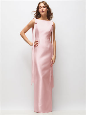 Blush satin column maxi dress with fitted waist, bateau neckline, and bow-tail straps