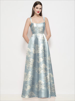 Sage satin maxi dress with gold floral print, square neckline, thin straps, pleated skirt