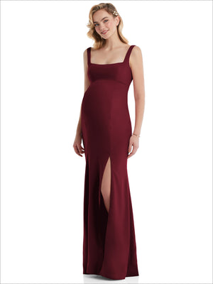 Burgundy maternity trumpet gown with wide square neckline, sleeveless straps, and side slit