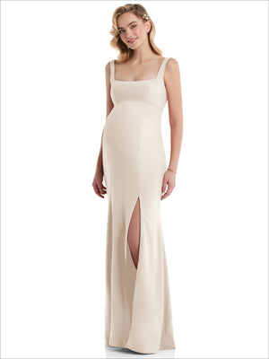 Ivory maternity trumpet gown with wide straps and square neckline, with front slit detail.
