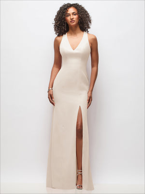 Ivory sleeveless maxi dress with V neckline and front slit.